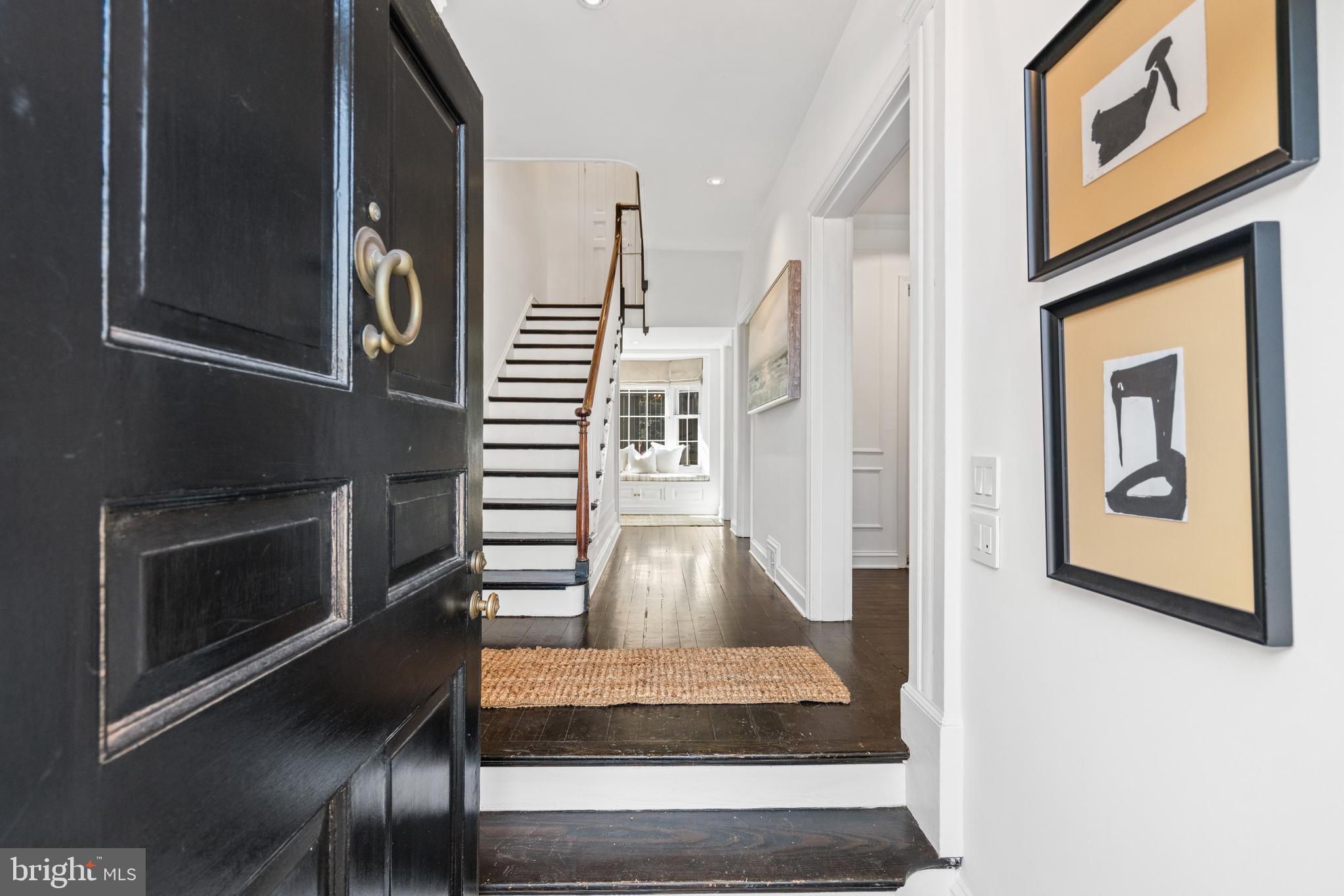 1698 32nd Street Northwest Washington, DC 20007 - Photo 3 of 29 a view of living room with furniture and a fireplace