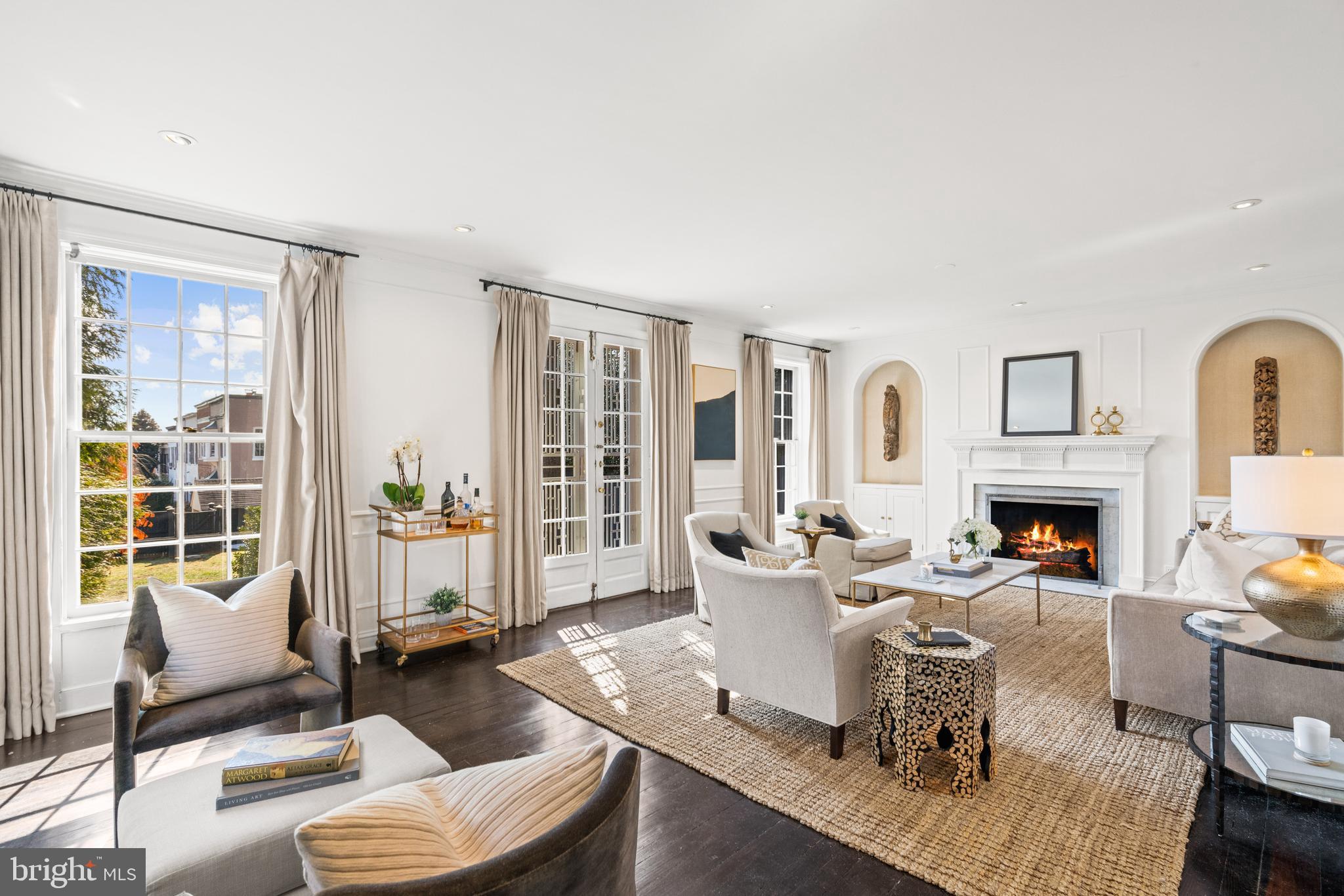 1698 32nd Street Northwest Washington, DC 20007 - Photo 4 of 29 a living room with fireplace furniture and a large window