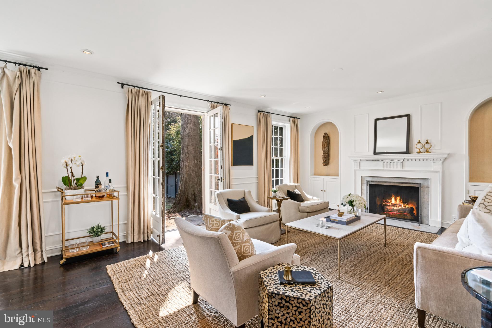 1698 32nd Street Northwest Washington, DC 20007 - Photo 5 of 29 a living room with furniture and a fireplace