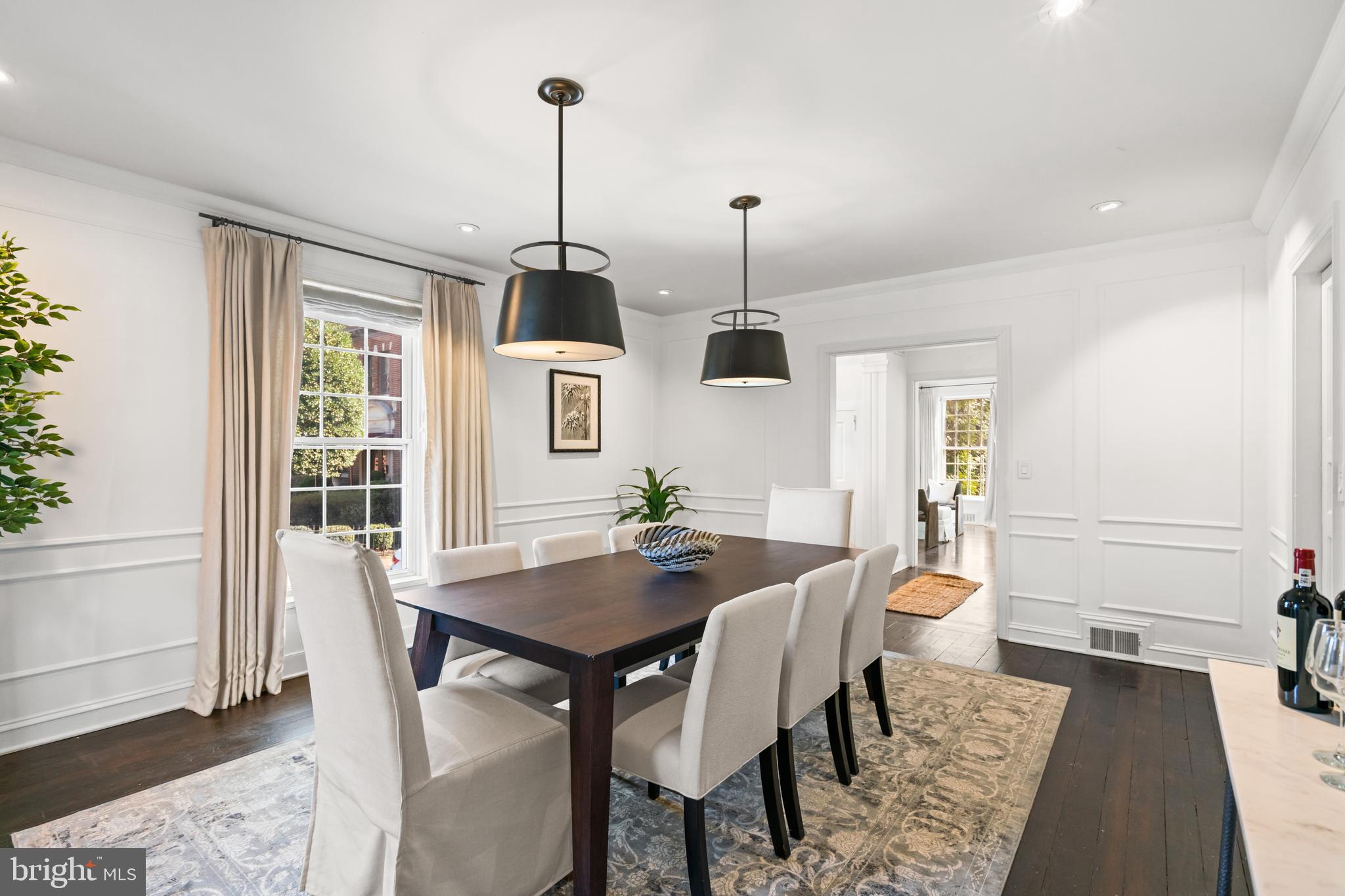 1698 32nd Street Northwest Washington, DC 20007 - Photo 7 of 29 a view of a dining room with furniture window and wooden floor
