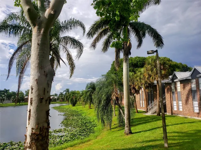 a view of a lake with a park