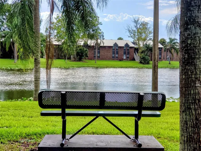 a view of a lake with a nearby beach