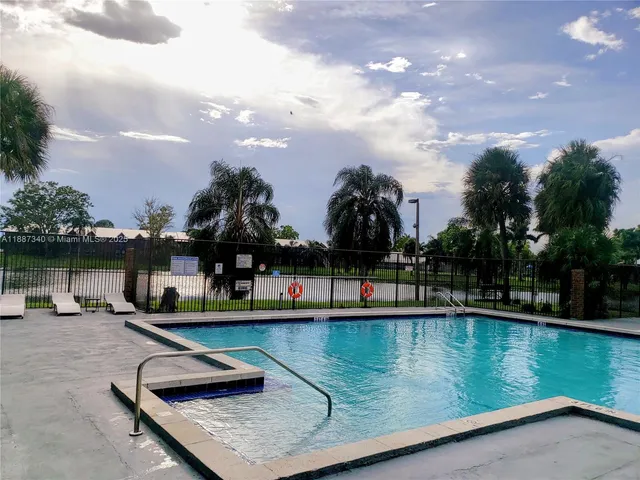 a view of a lake with a house