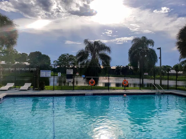 a view of a lake with a outdoor space
