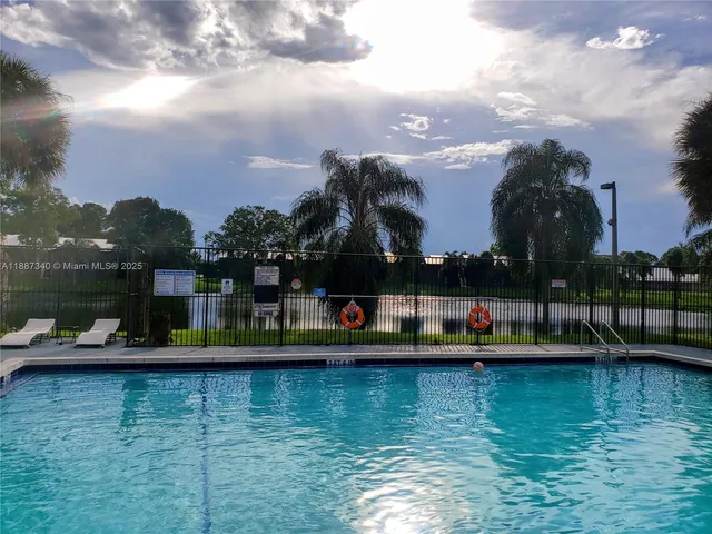 a view of a lake with a outdoor space