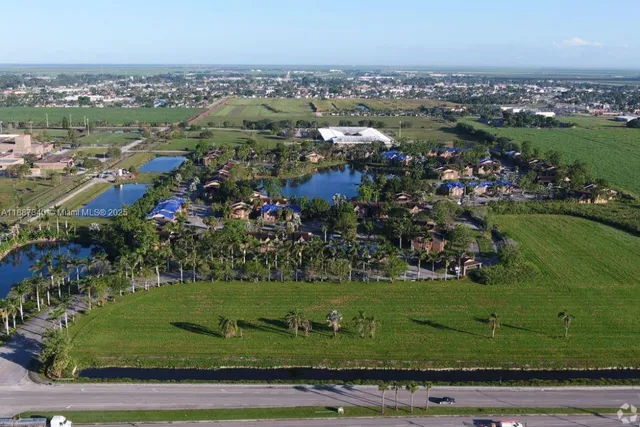 a view of an outdoor space and tennis court