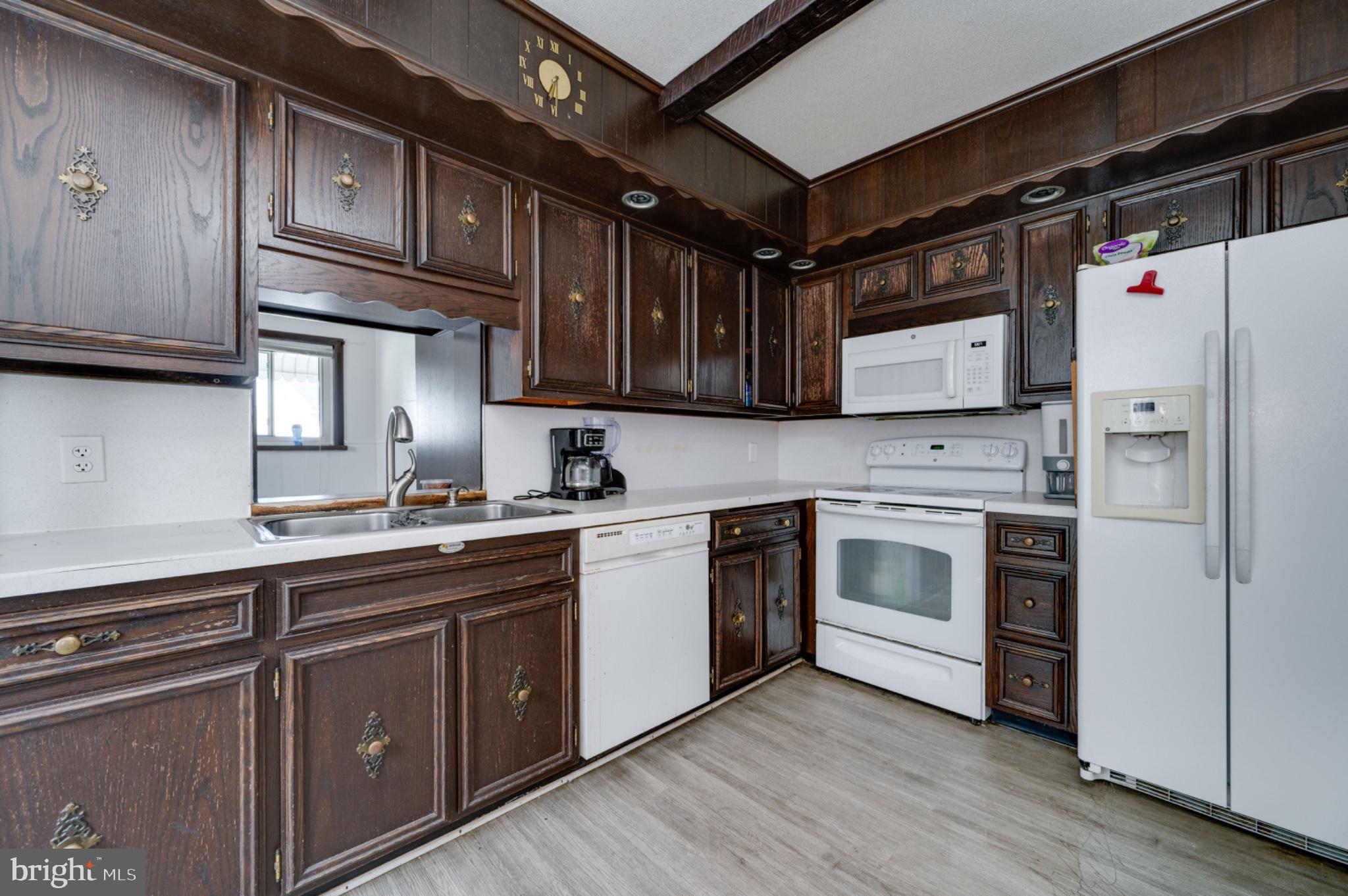 1448 Luzerne Street Reading, PA 19601 - Photo 10 of 32 Charming kitchen with rich wood accents.