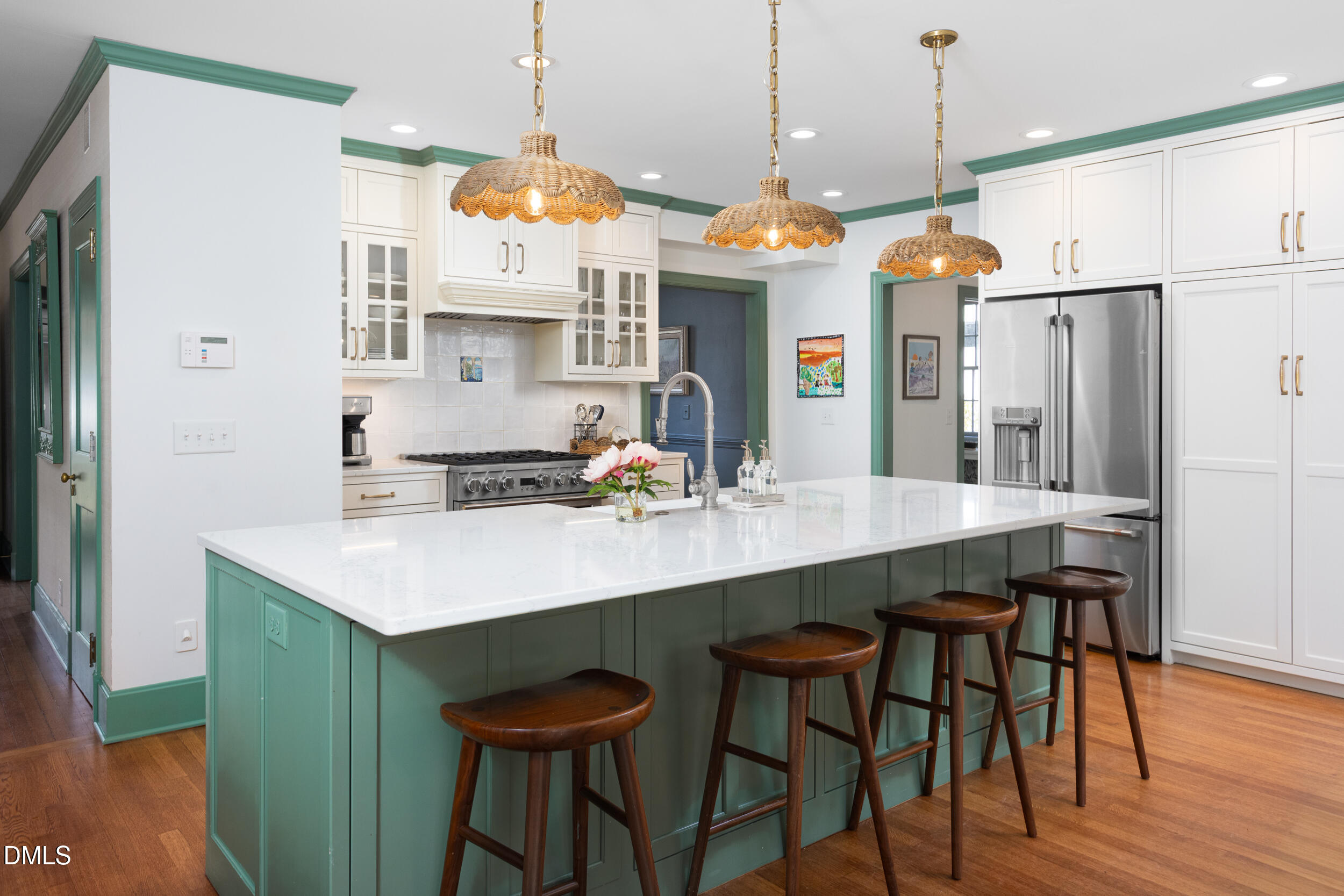 3433 Dover Road Durham, NC 27707 - Photo 11 of 56 a kitchen with a table and chairs in it