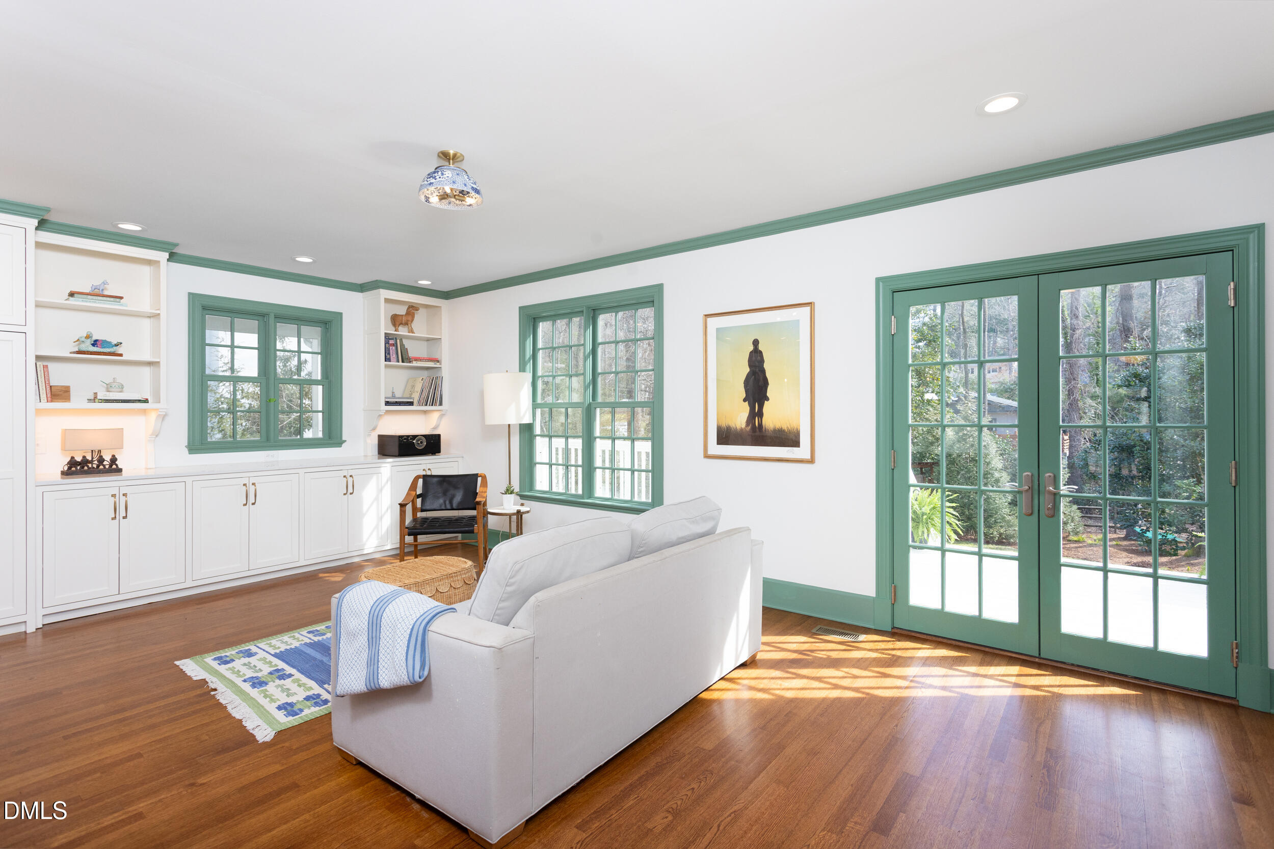 3433 Dover Road Durham, NC 27707 - Photo 14 of 56 a living room with furniture and a large window