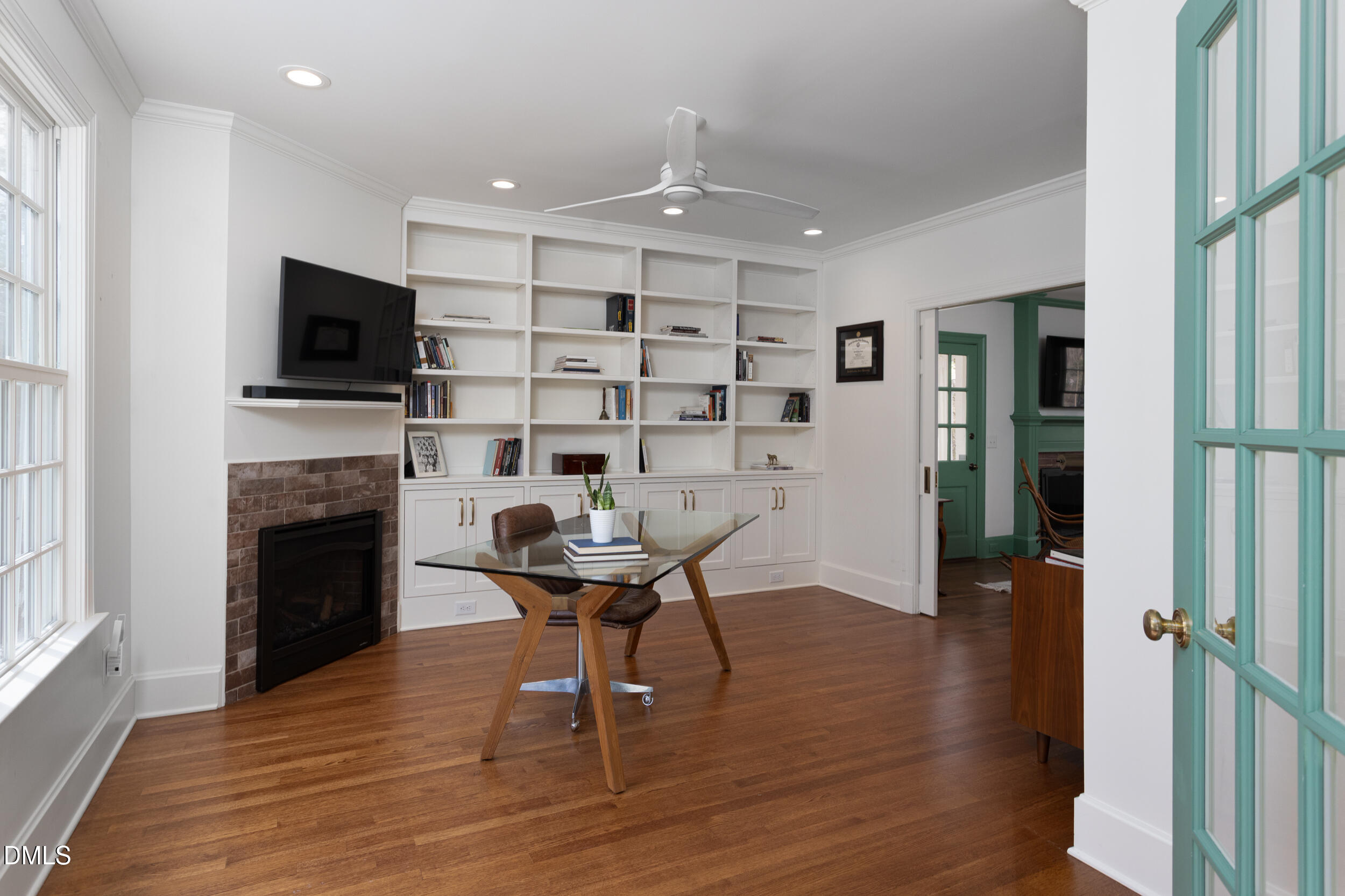 3433 Dover Road Durham, NC 27707 - Photo 23 of 56 a view of a livingroom with furniture and a fireplace