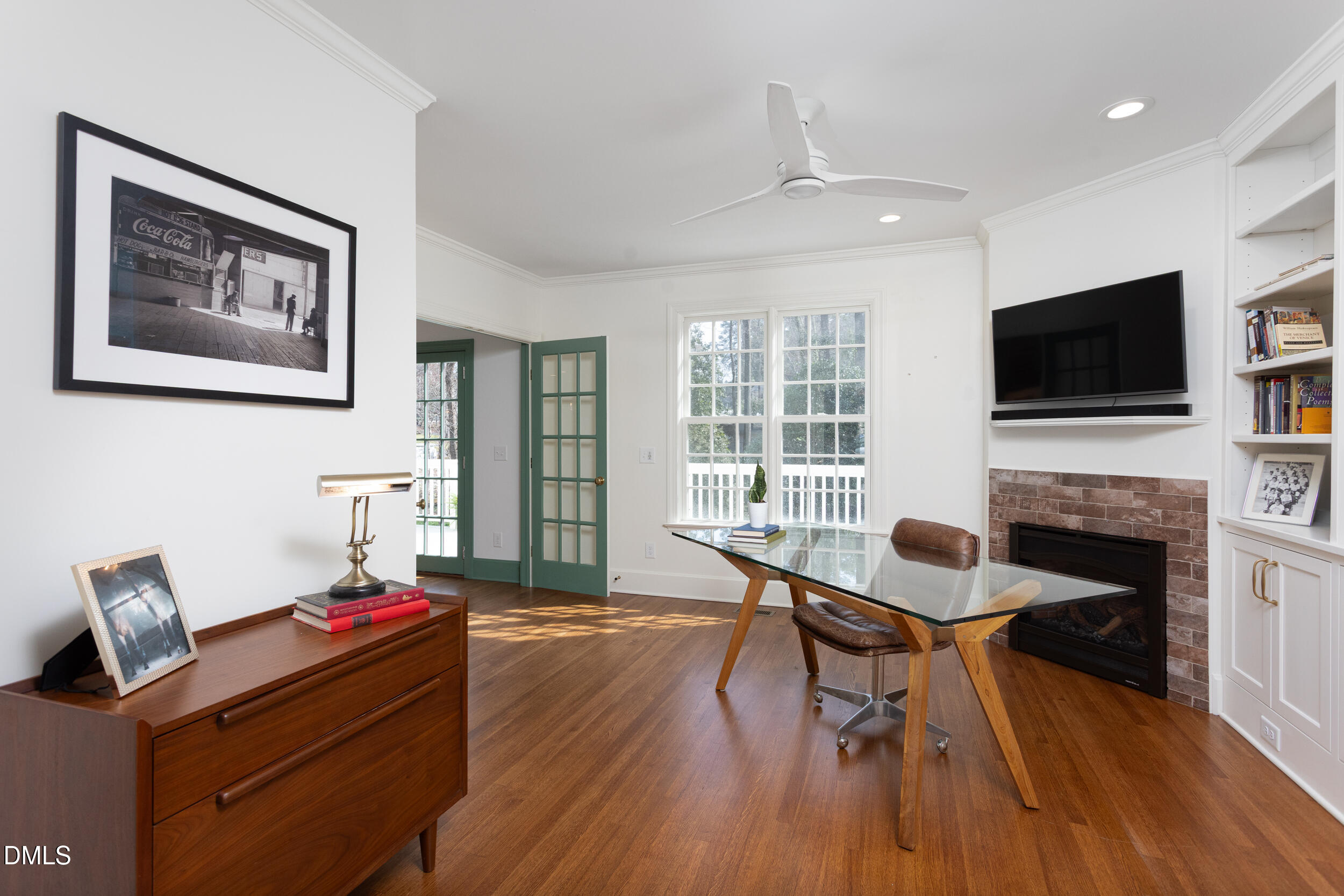 3433 Dover Road Durham, NC 27707 - Photo 24 of 56 a living room with furniture and a flat screen tv