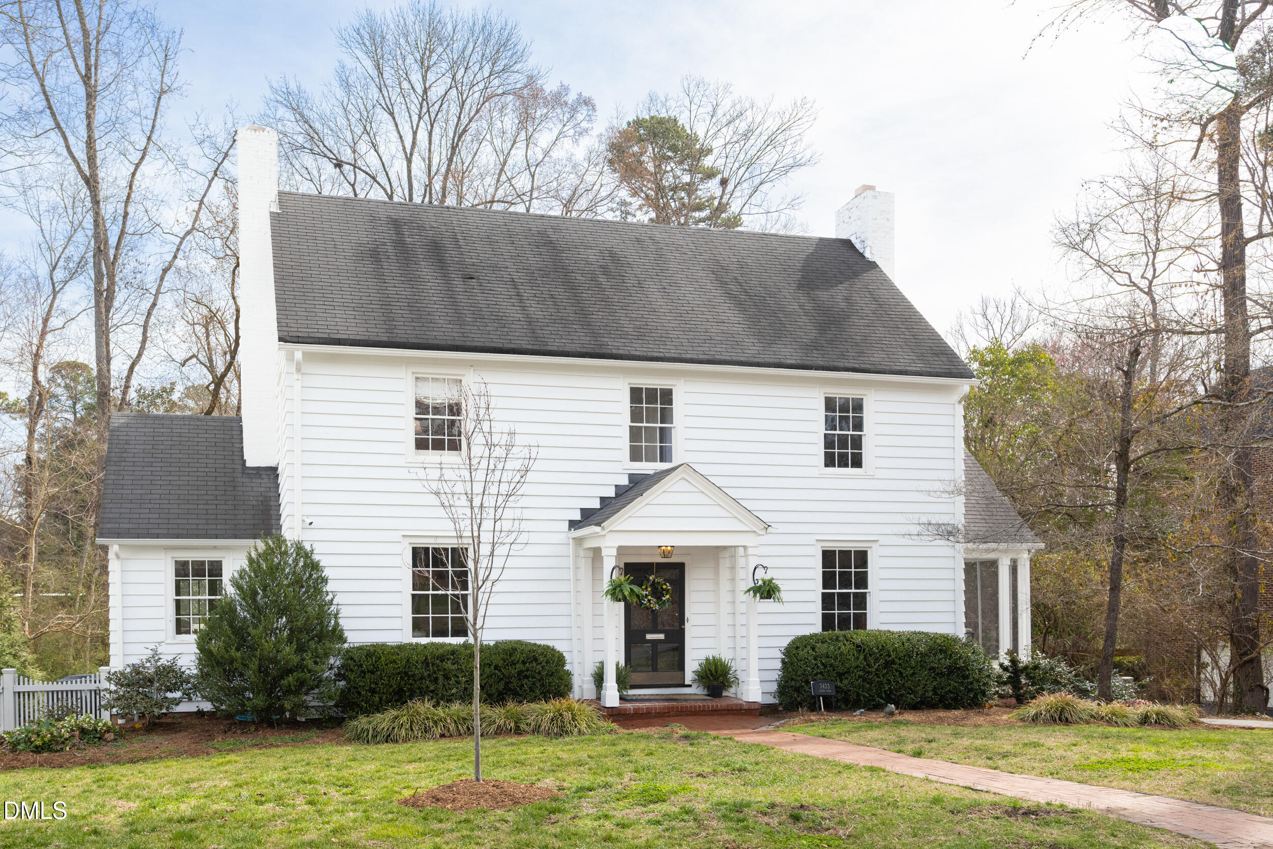3433 Dover Road Durham, NC 27707 - Photo 2 of 56 a front view of house with yard and green space