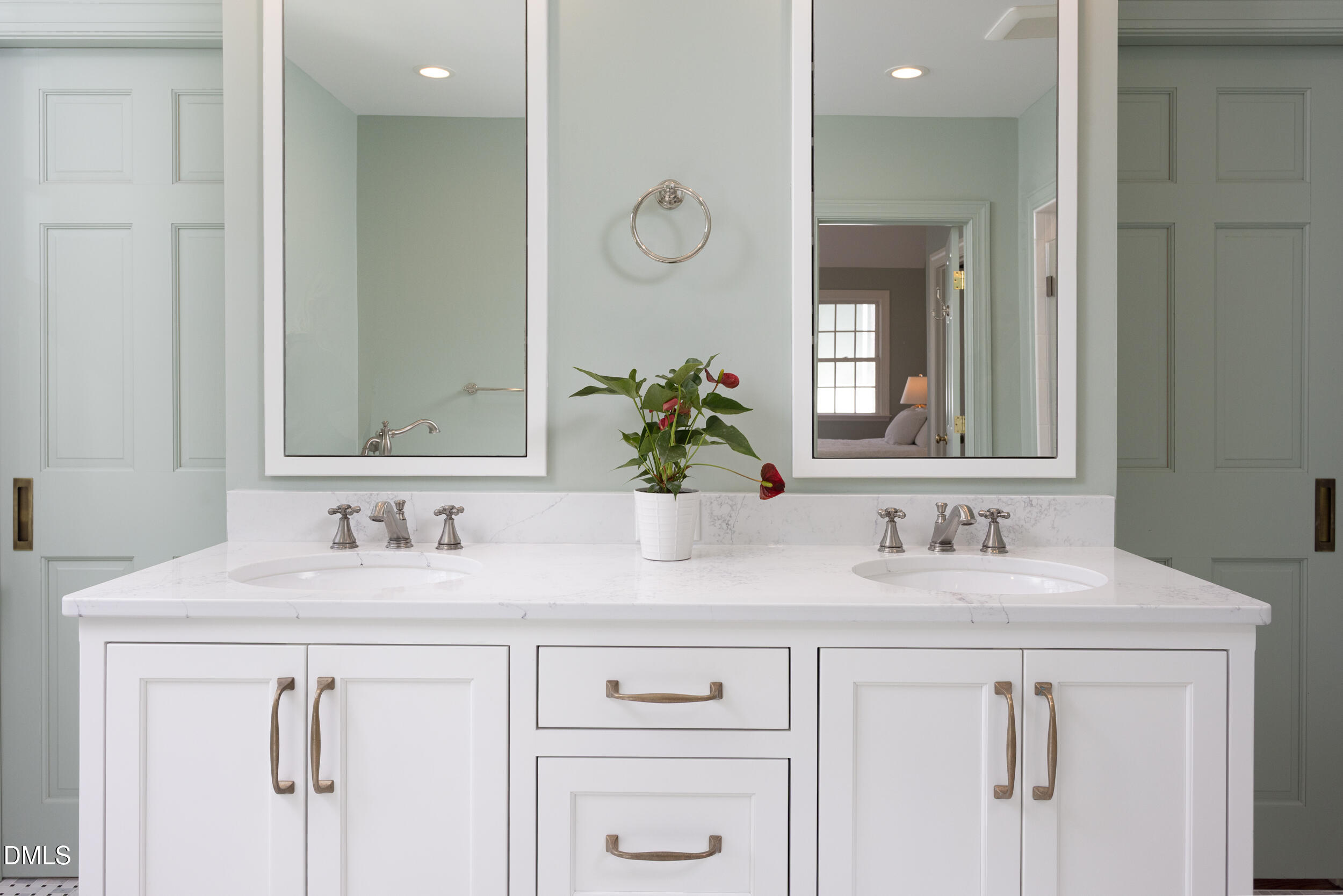 3433 Dover Road Durham, NC 27707 - Photo 30 of 56 a bathroom with a sink vanity and a mirror