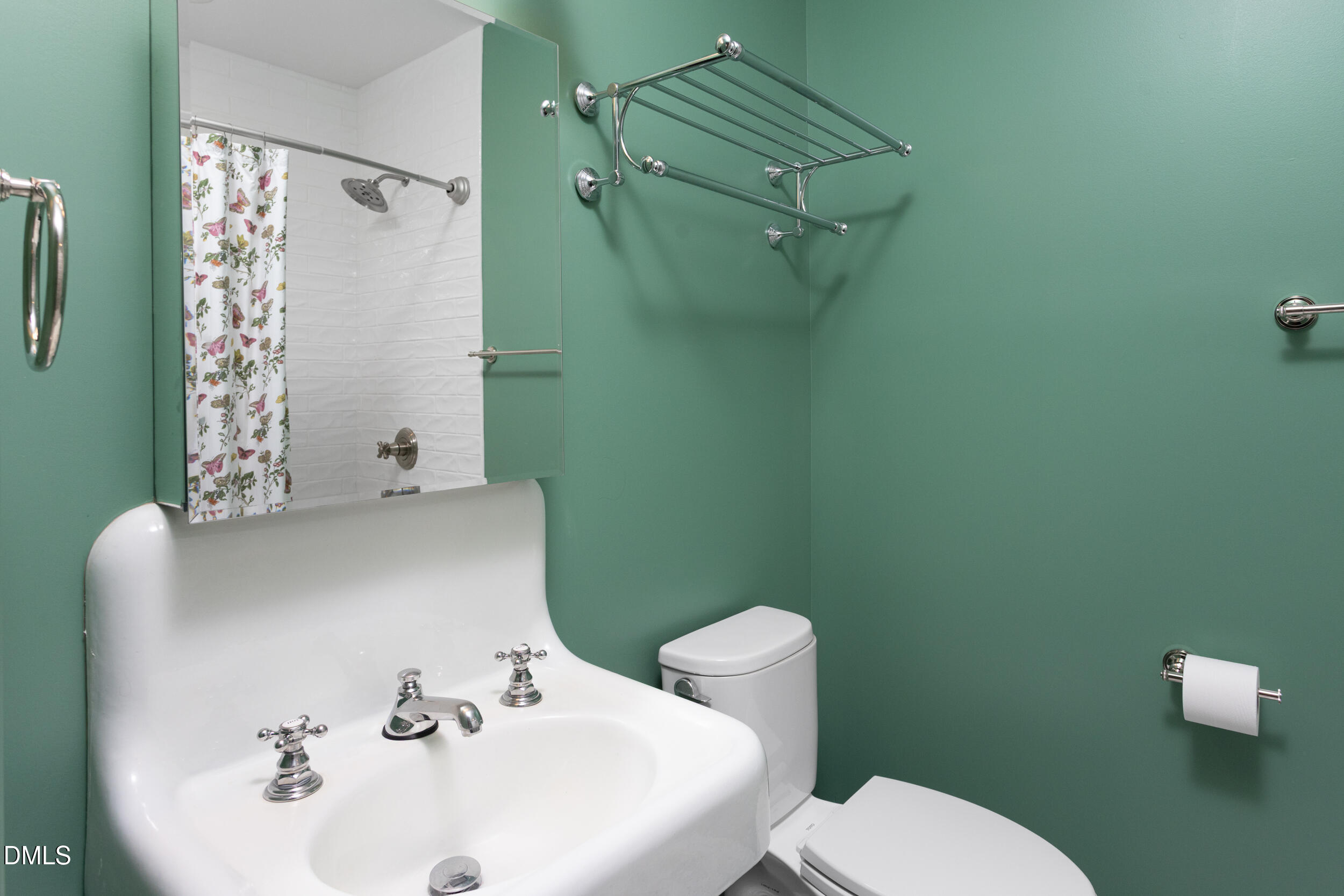 3433 Dover Road Durham, NC 27707 - Photo 34 of 56 a bathroom with a sink toilet and shower