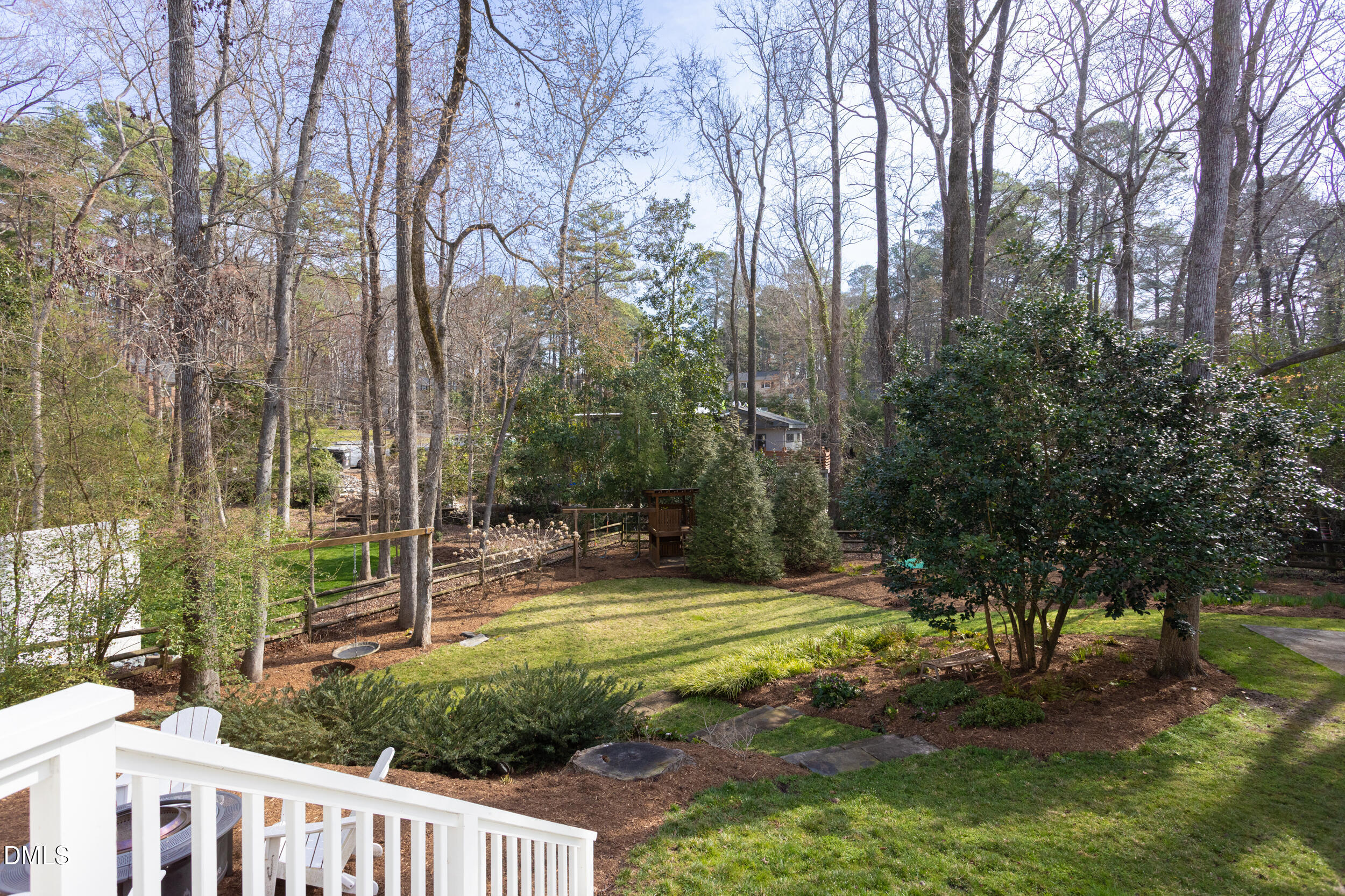 3433 Dover Road Durham, NC 27707 - Photo 45 of 56 a view of a yard with plants and trees
