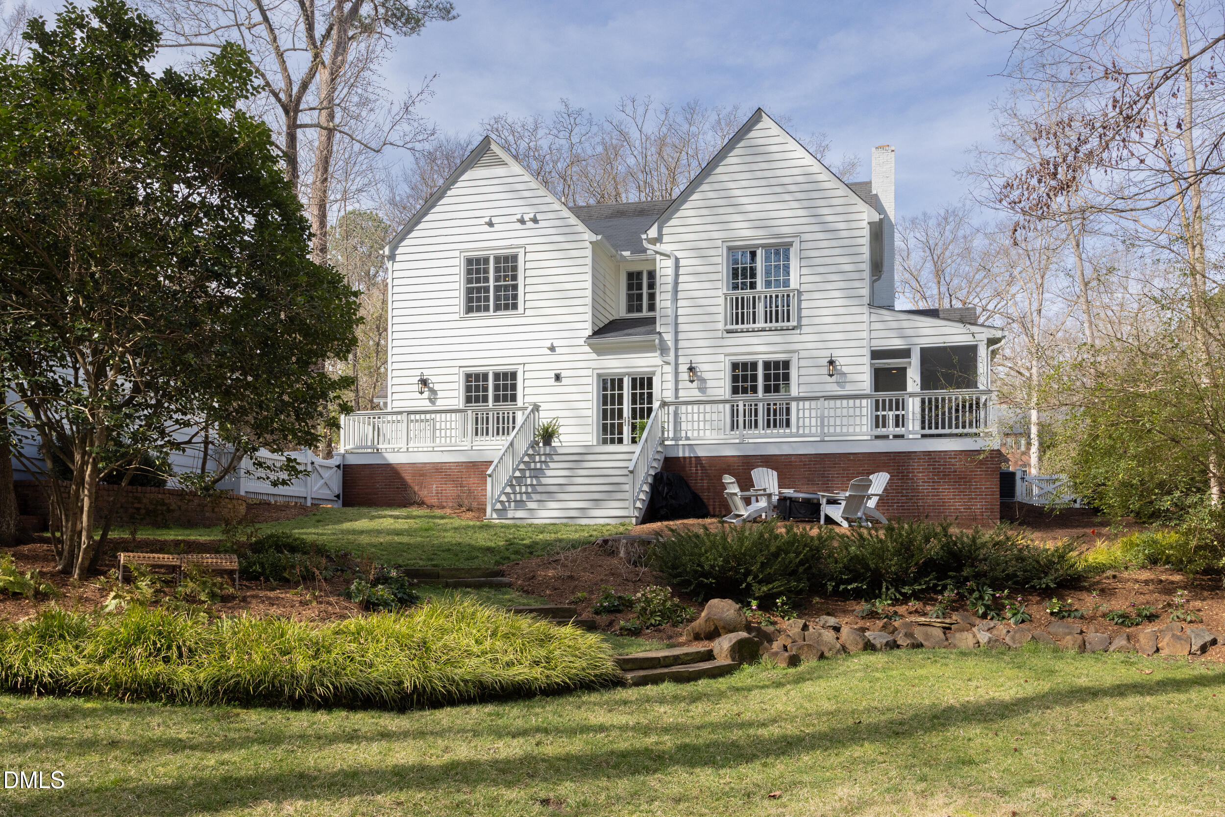 3433 Dover Road Durham, NC 27707 - Photo 49 of 56 a front view of a house with a yard and garage