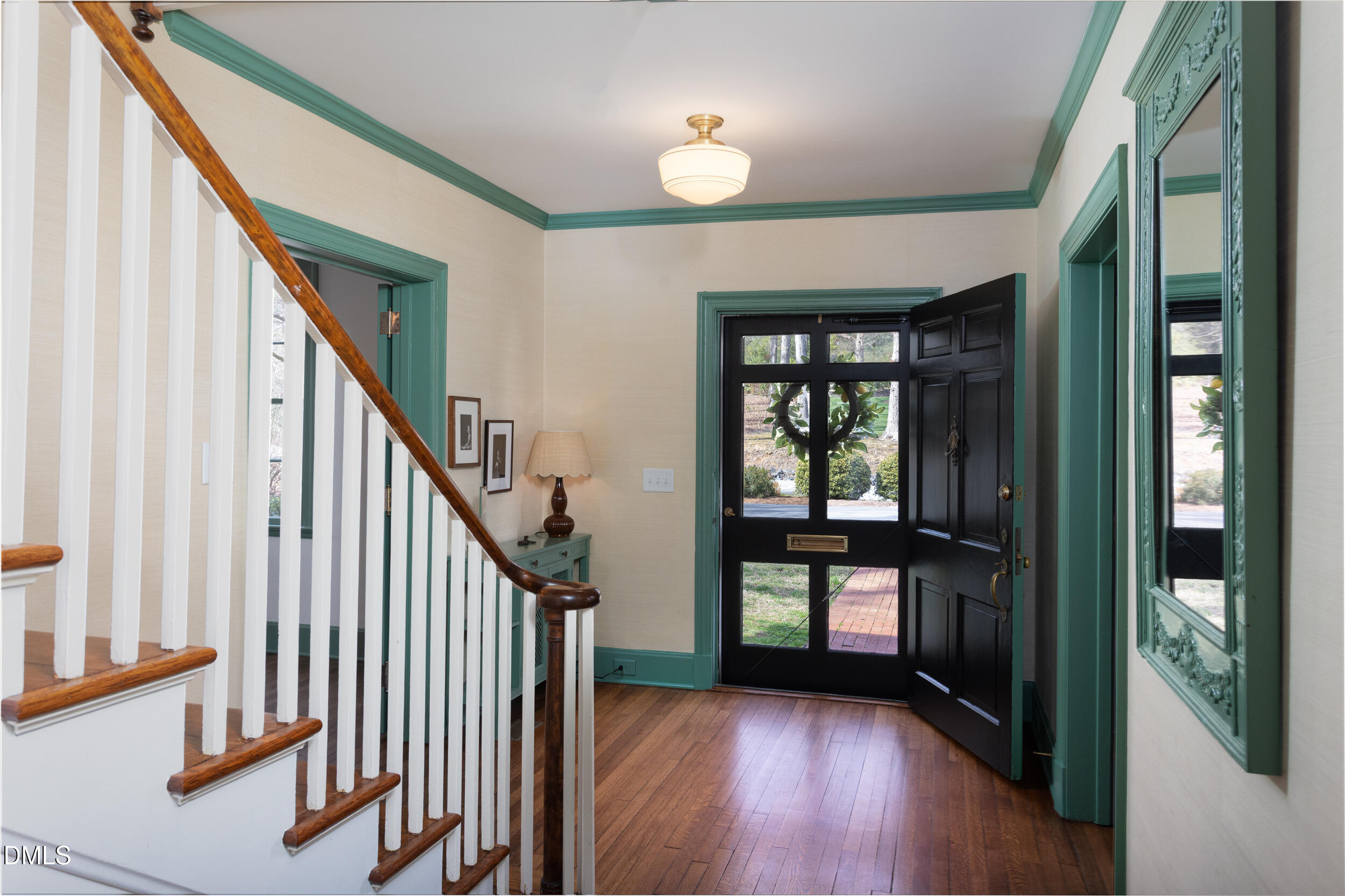 3433 Dover Road Durham, NC 27707 - Photo 4 of 56 wooden floor in an empty room with a window