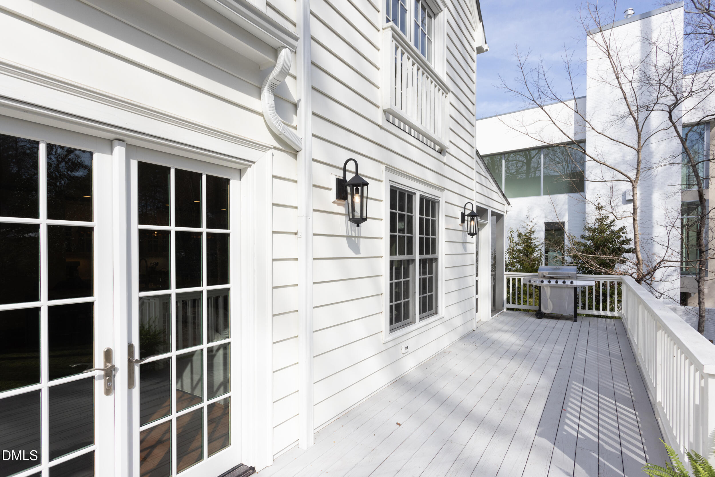 3433 Dover Road Durham, NC 27707 - Photo 51 of 56 a view of house with a large window and wooden floor