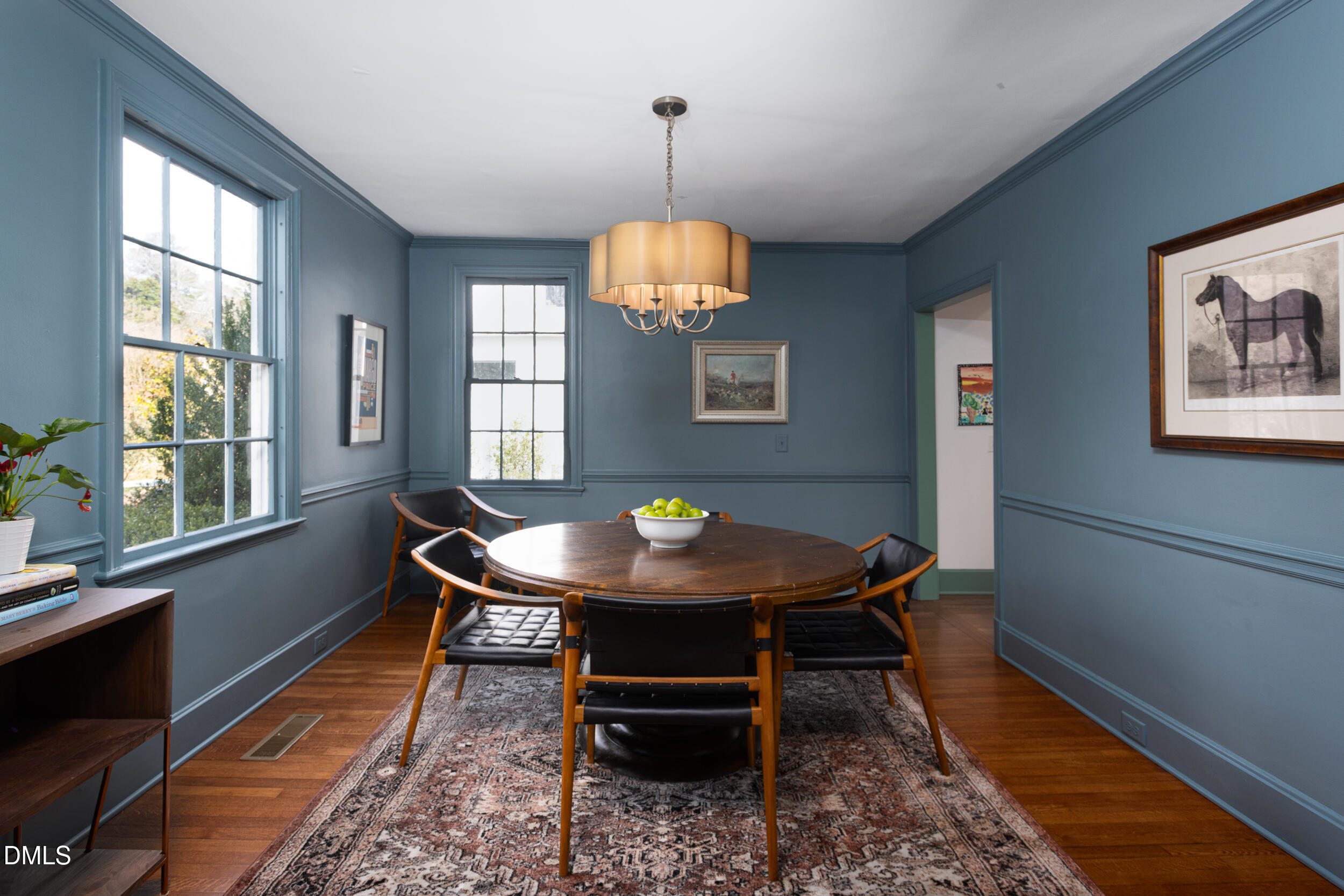 3433 Dover Road Durham, NC 27707 - Photo 6 of 56 a dining room with wooden floor and a window