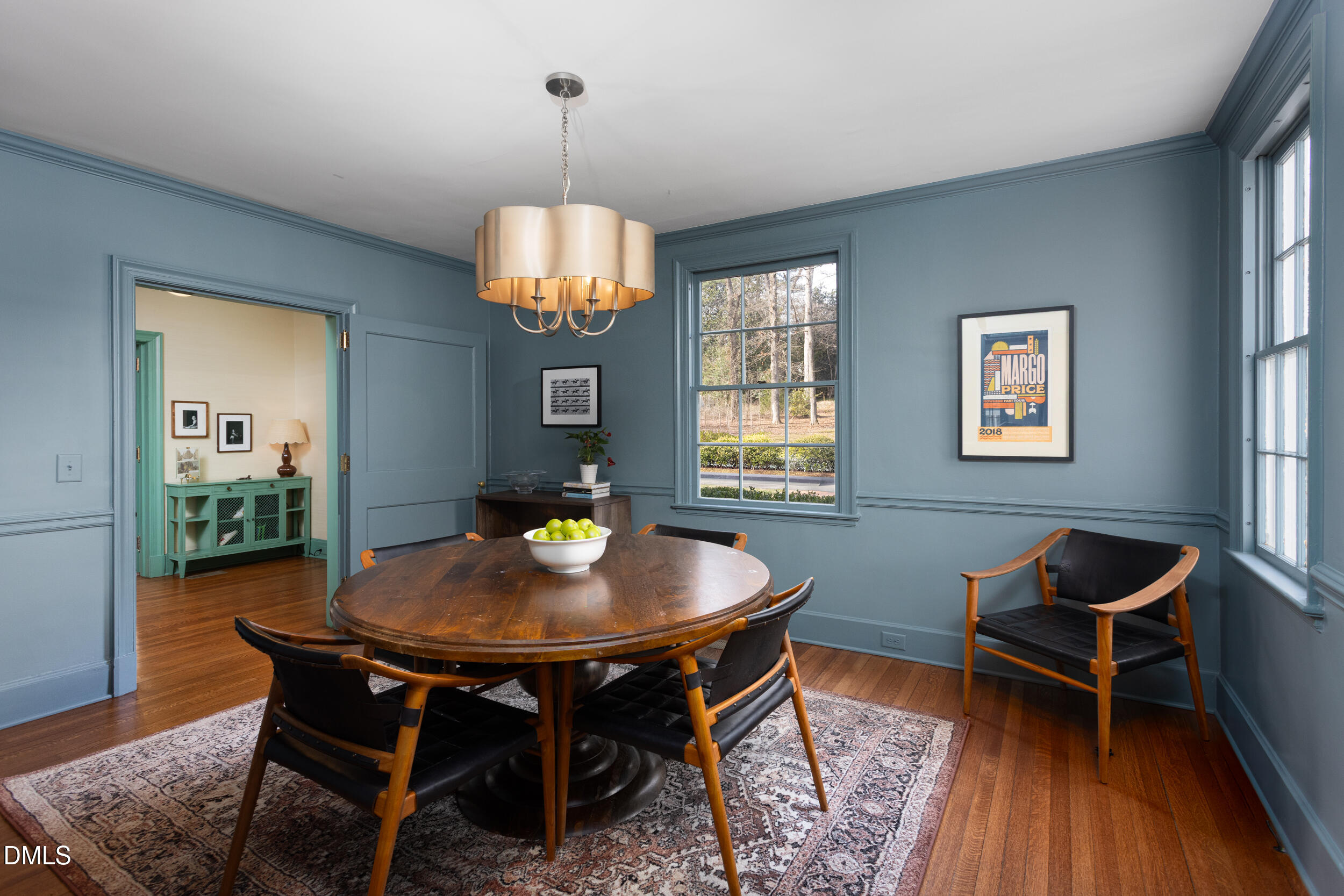 3433 Dover Road Durham, NC 27707 - Photo 7 of 56 a view of a dining room with furniture window and wooden floor