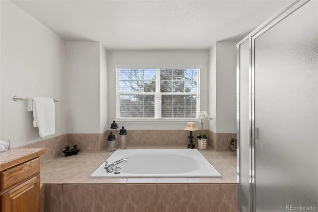 $830,000 | 8316 Briar Ridge Drive, Castle Pines, CO 80108