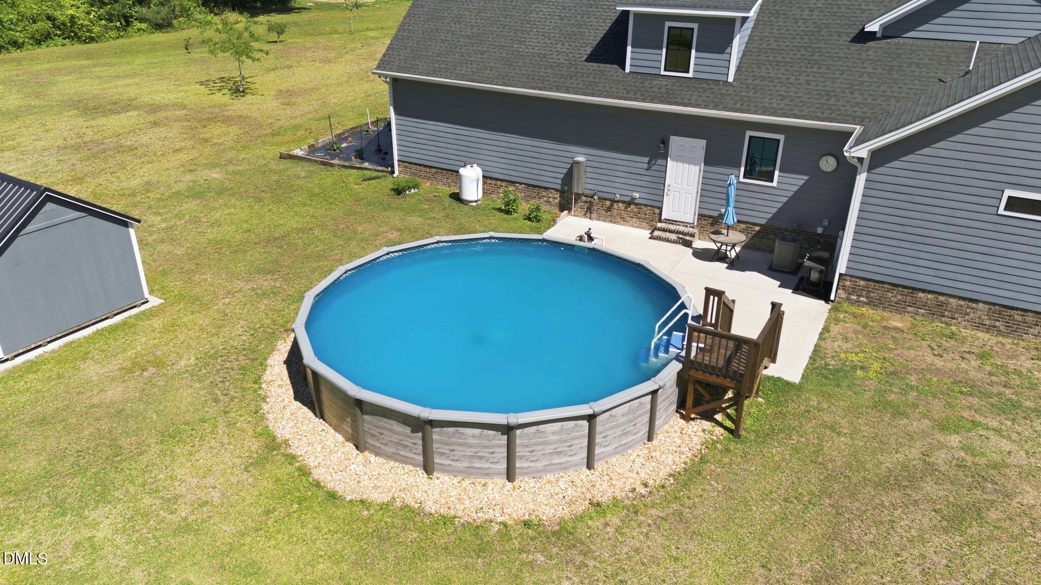 35 North Rippling Court Smithfield, NC 27577 - Photo 54 of 59 a view of a swimming pool with an outdoor seating