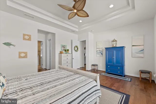 a bathroom with a double vanity sink mirror and shower