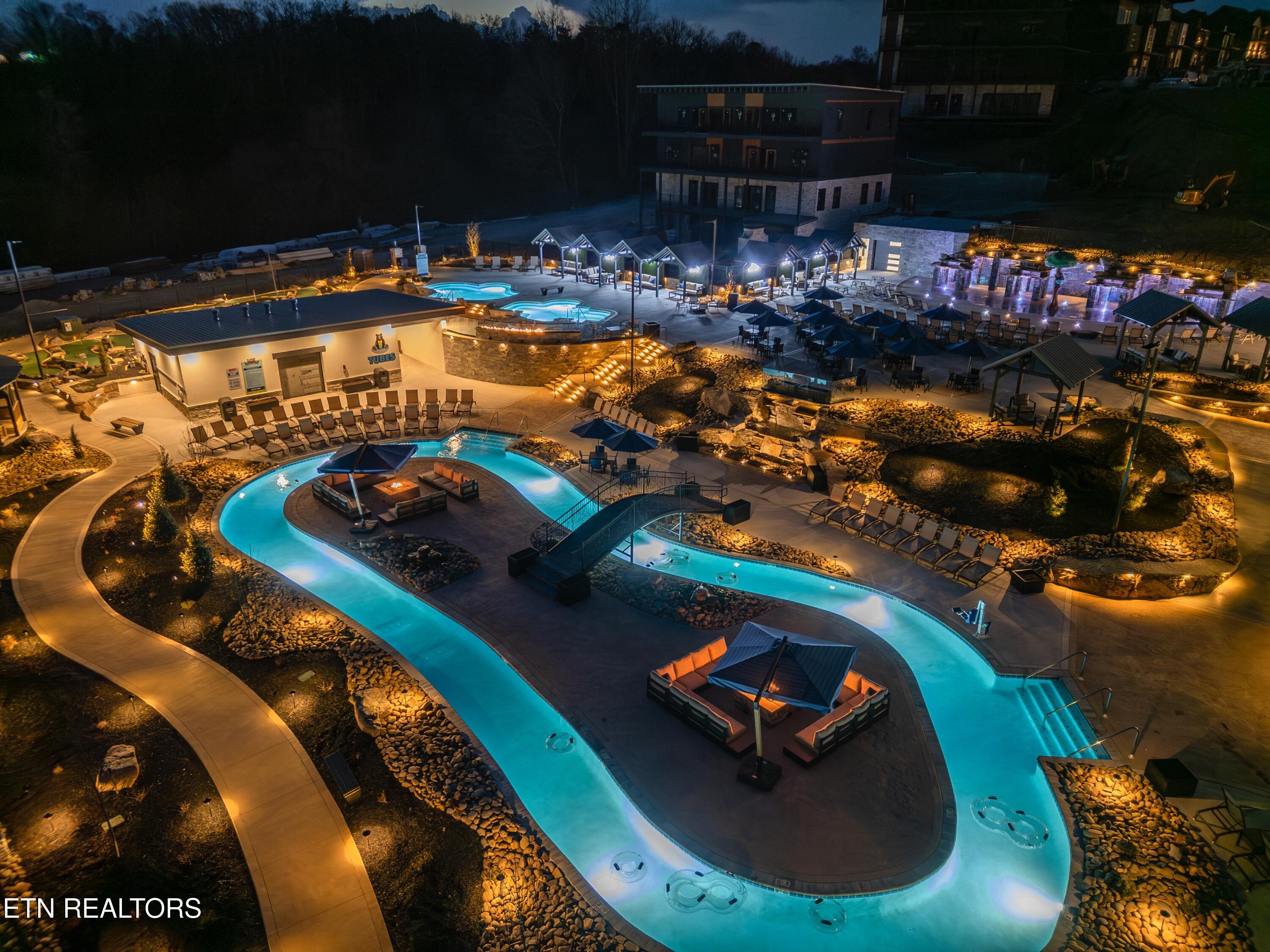 1319 Wildhorse Ridge Way, Unit LOT143R Sevierville, TN 37862 - Photo 55 of 57 Lazy River at night