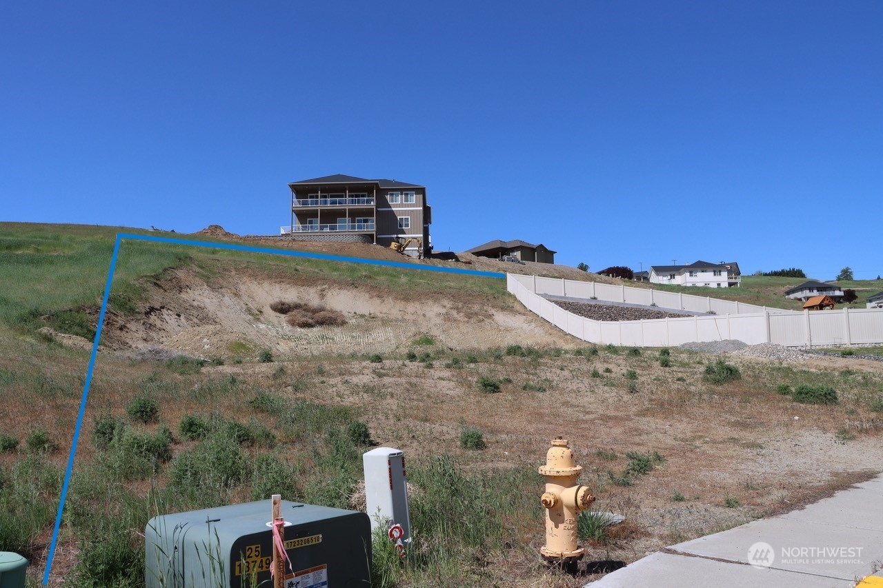 91 Sunny Meadows Loop Wenatchee, WA 98801 - Photo 15 of 17 a view of a pool with a yard