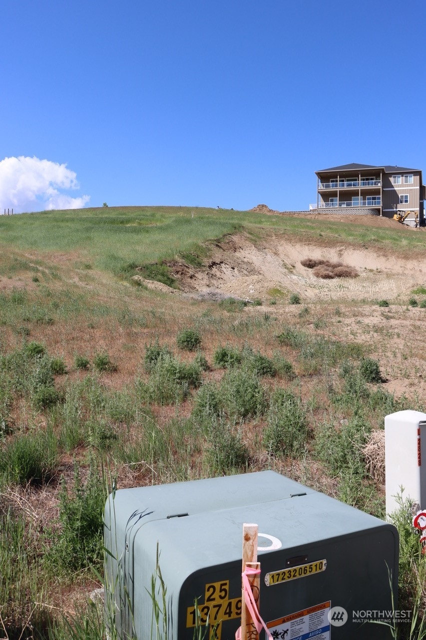 91 Sunny Meadows Loop Wenatchee, WA 98801 - Photo 4 of 17 a view of a yard with an outdoor space