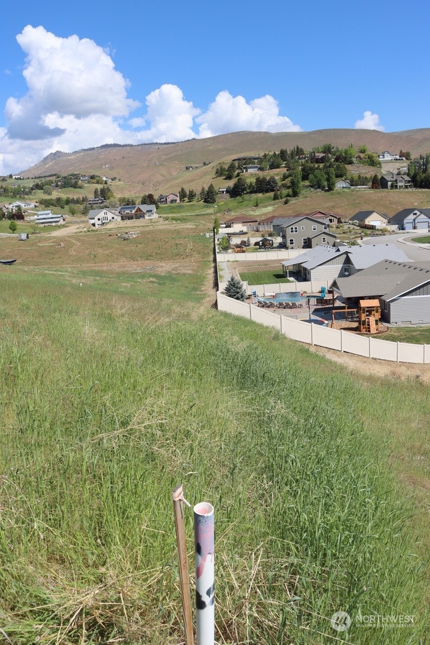 91 Sunny Meadows Loop Wenatchee, WA 98801 - Photo 8 of 17 a view of a lake with houses