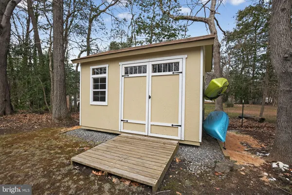 a view of a backyard of the house