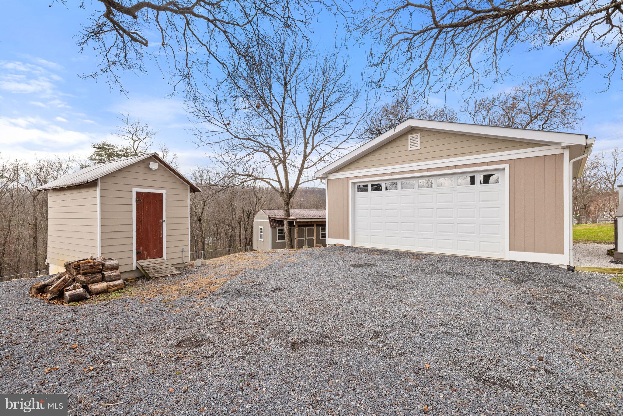 239 McDonald Road Winchester, VA 22602 - Photo 15 of 20 a front view of a house with a yard