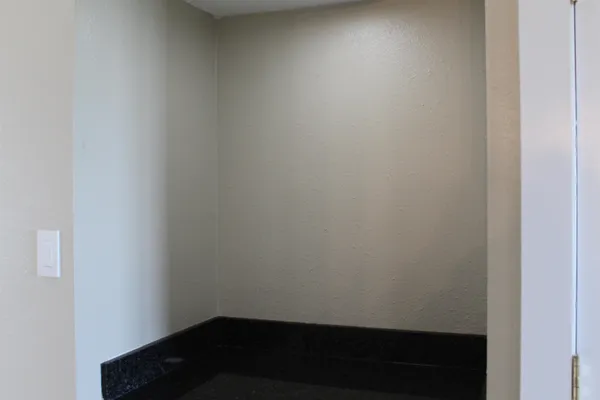 a room with a bench