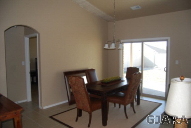 167 Red Rocks Street Fruita, CO 81521 - Photo 3 of 9 a view of a dining room with furniture and a window