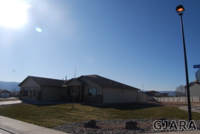 167 Red Rocks Street Fruita, CO 81521 - Photo 9 of 9 a view of a street with an outdoor seating