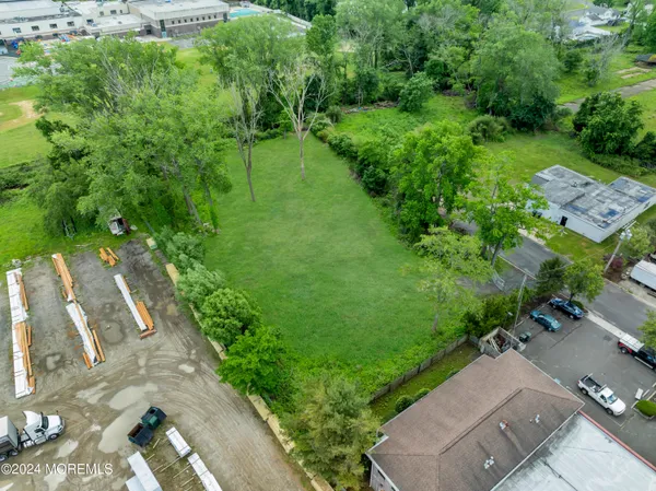 an aerial view of residential house with outdoor space