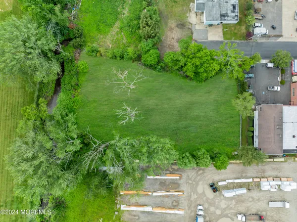 a view of a garden with a building