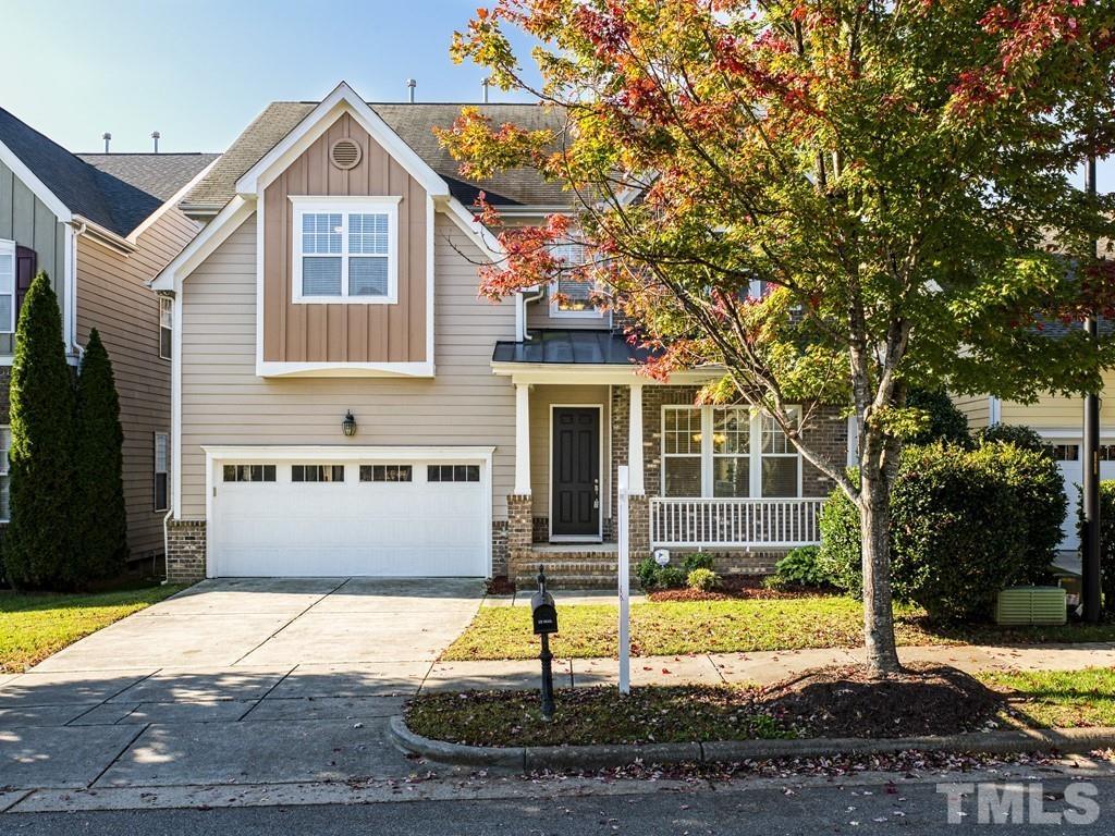 1136 Chapanoke Road Raleigh, NC 27603 - Photo 2 of 30 a front view of a house with garden