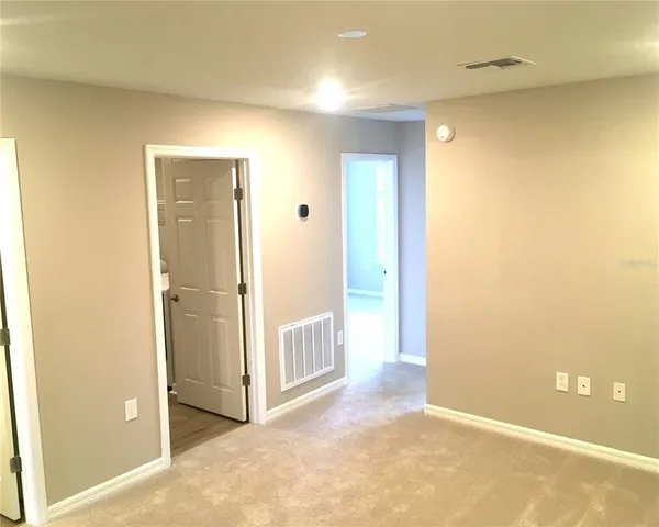 a bathroom with a toilet a sink and bathtub