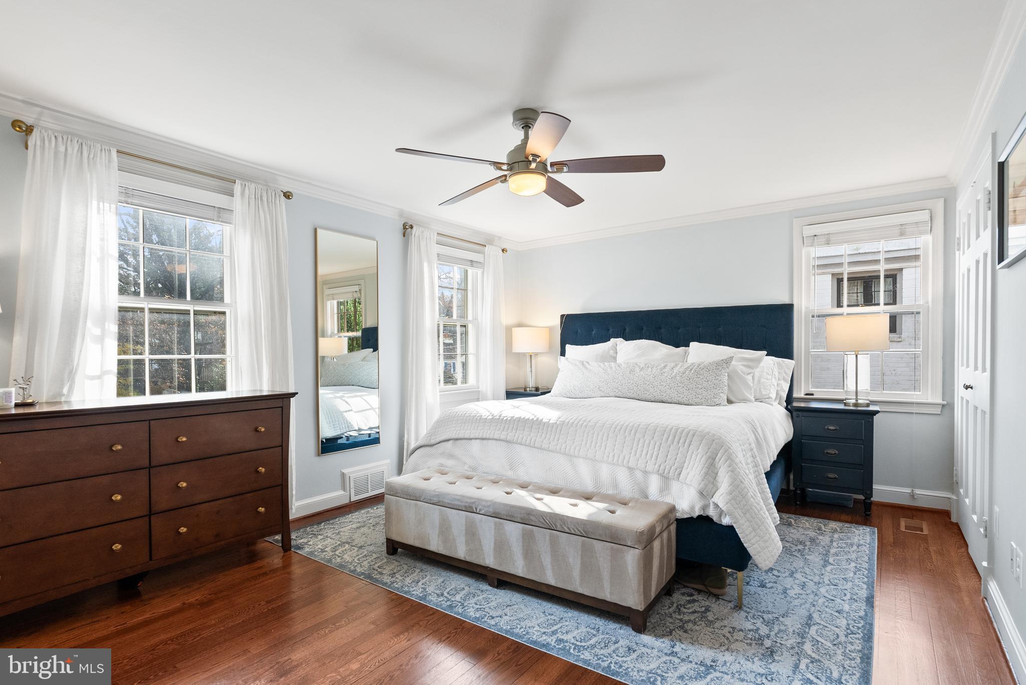 4213 Leland Street Chevy Chase, MD 20815 - Photo 14 of 33 a bedroom with a bed and wooden floor