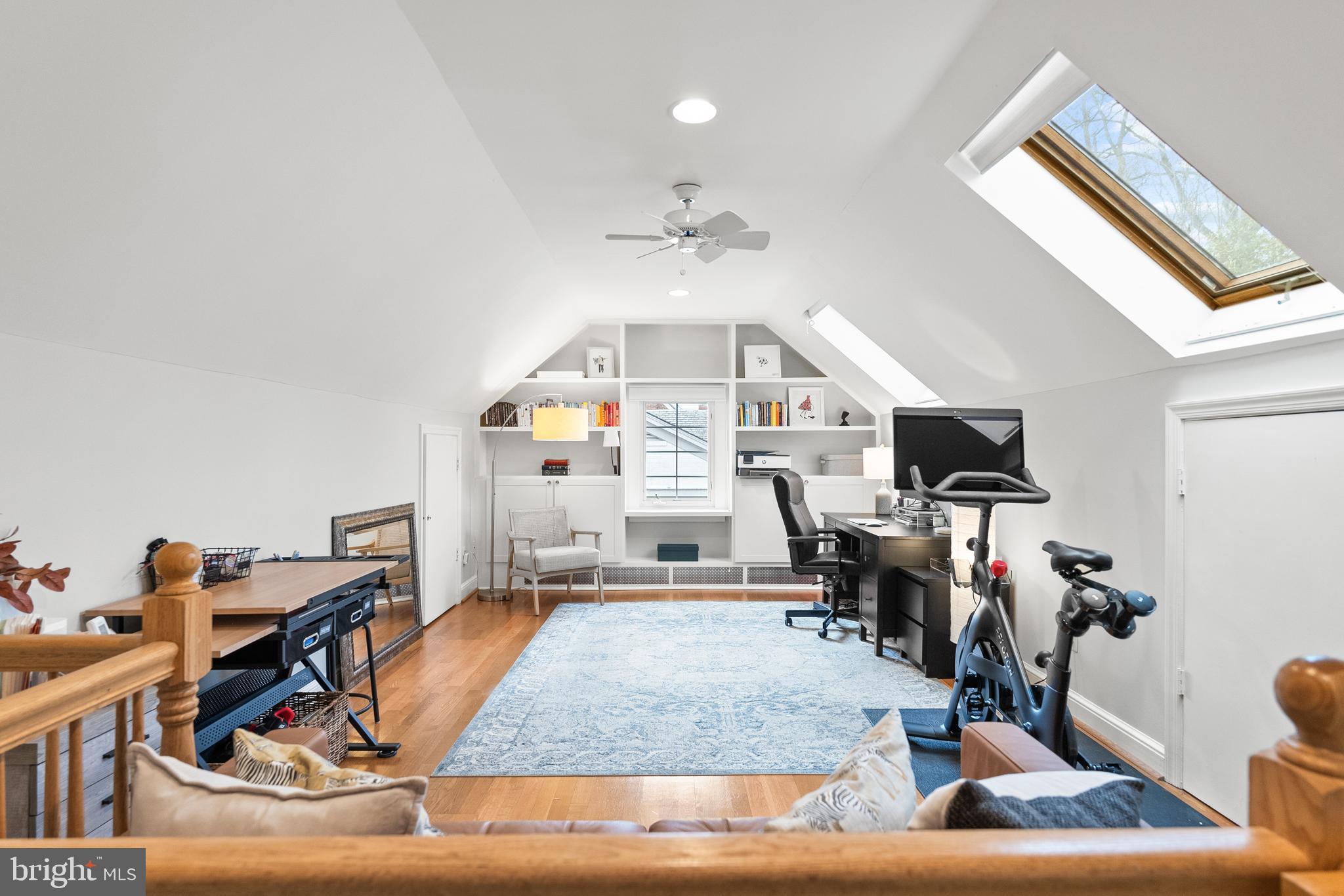 4213 Leland Street Chevy Chase, MD 20815 - Photo 17 of 33 a living room with furniture a window and a flat screen tv