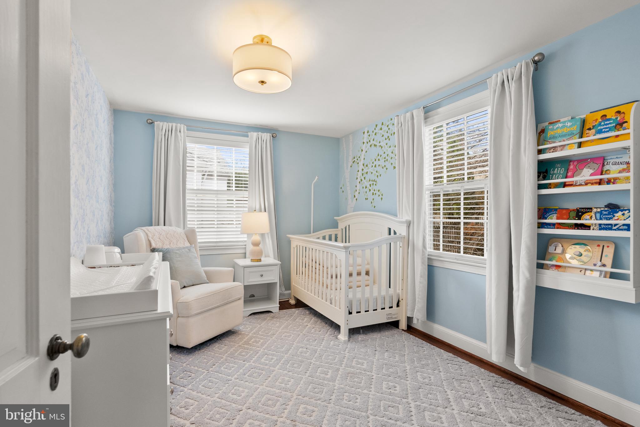 4213 Leland Street Chevy Chase, MD 20815 - Photo 19 of 33 a living room with furniture and a window