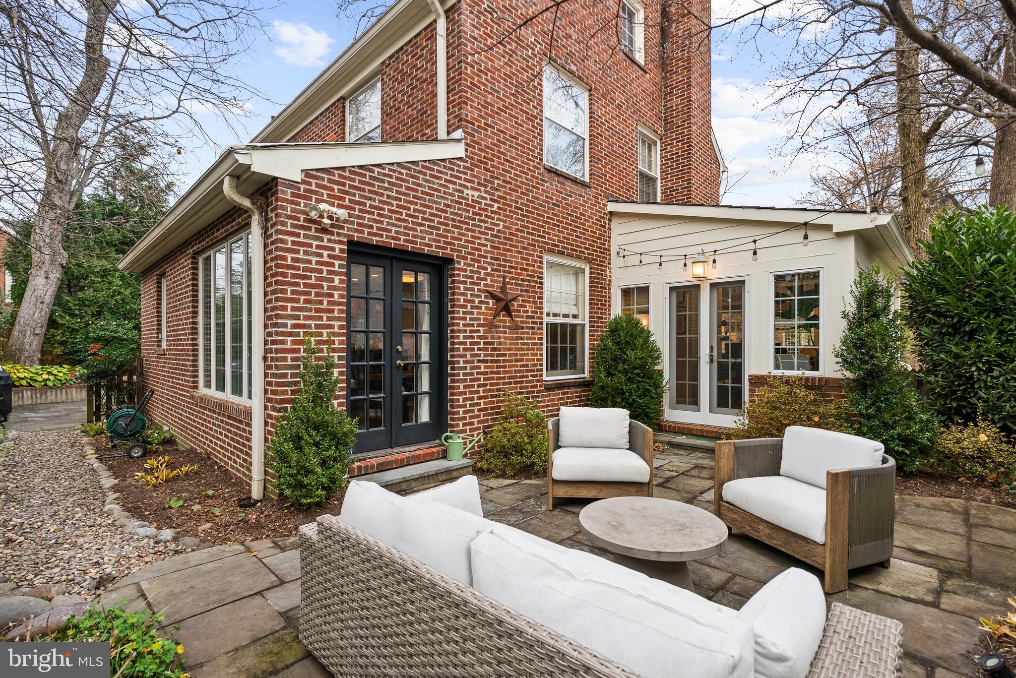 4213 Leland Street Chevy Chase, MD 20815 - Photo 24 of 33 a view of a patio with couches table and chairs and potted plants