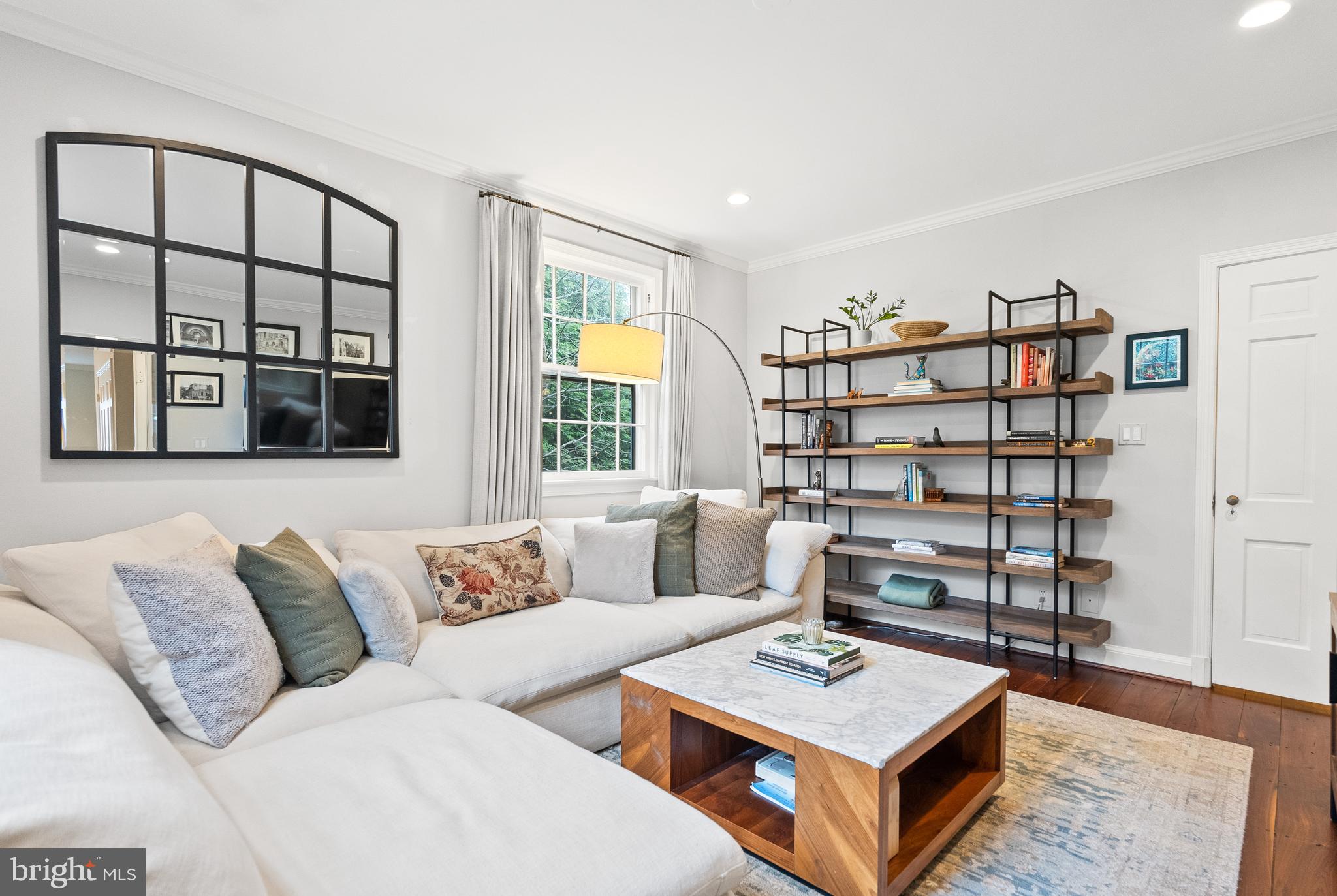 4213 Leland Street Chevy Chase, MD 20815 - Photo 9 of 33 a living room with furniture and a large window
