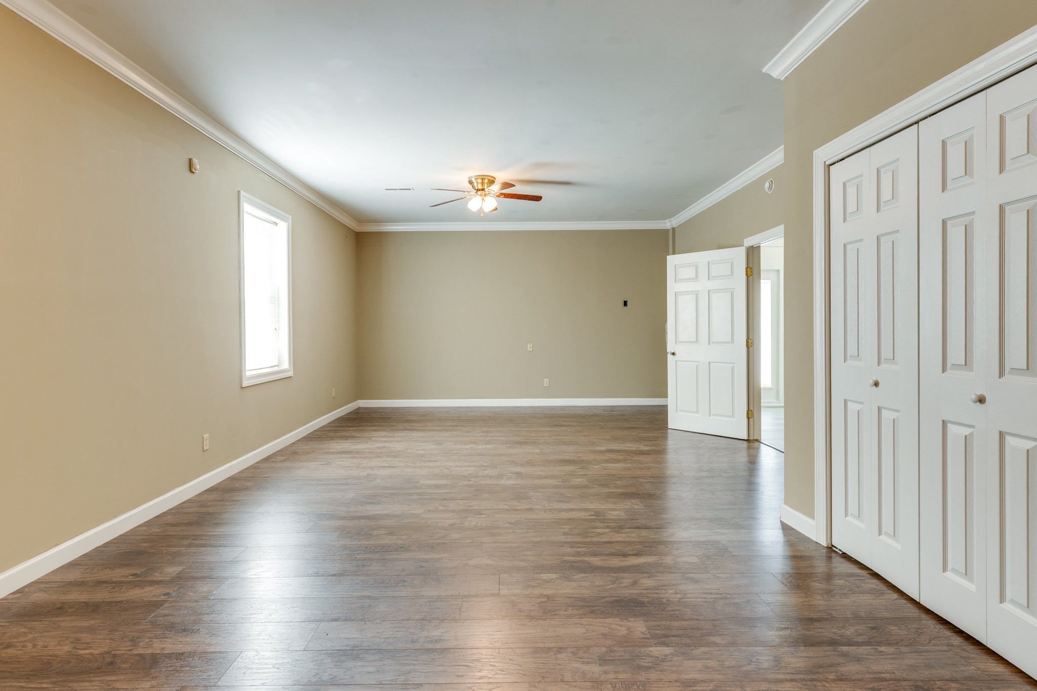 4655 Hardison Mill Road Columbia, TN 38401 - Photo 16 of 47 wooden floor in an empty room with a window