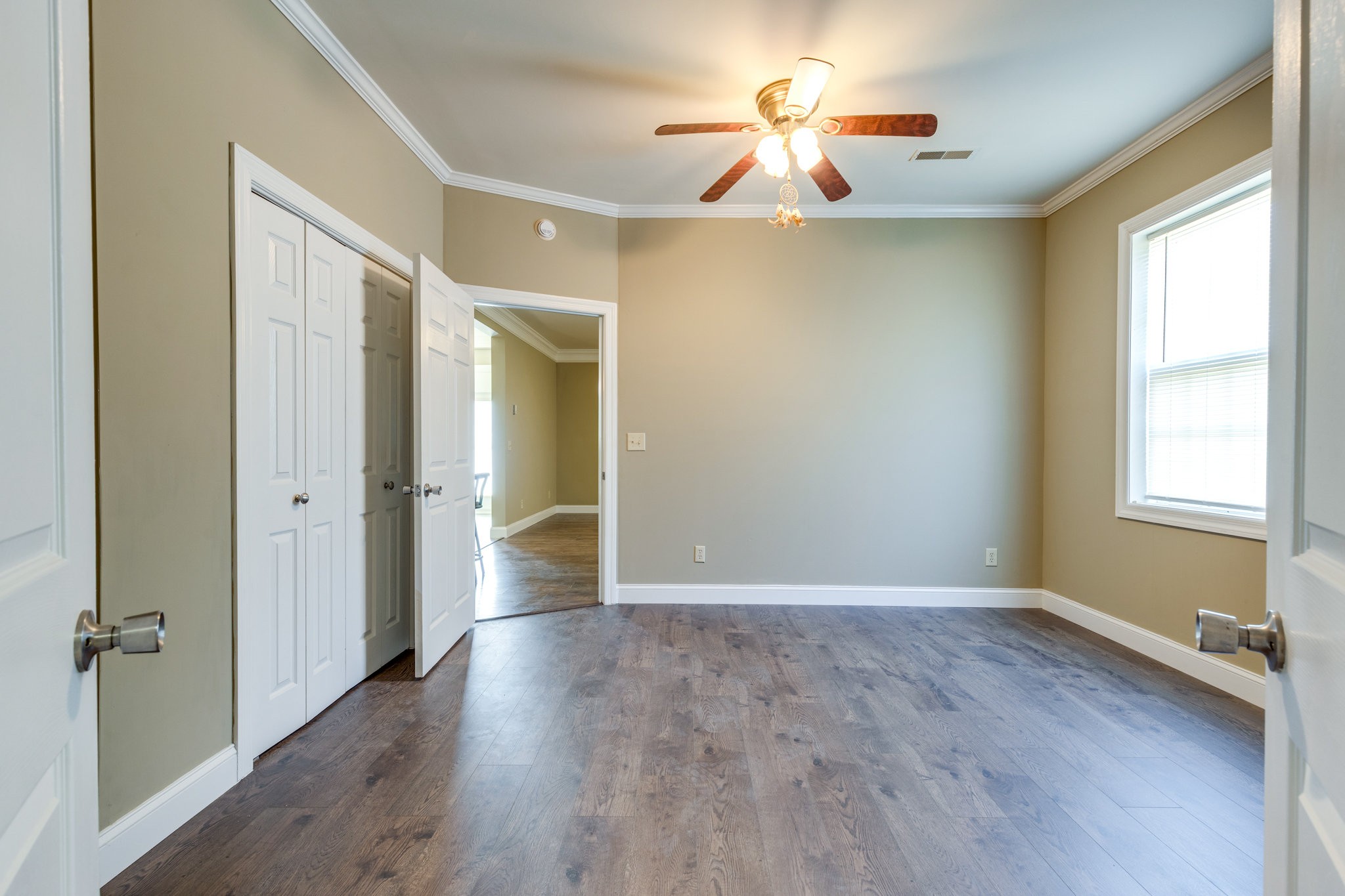 4655 Hardison Mill Road Columbia, TN 38401 - Photo 23 of 47 a view of an empty room with a window and wooden floor