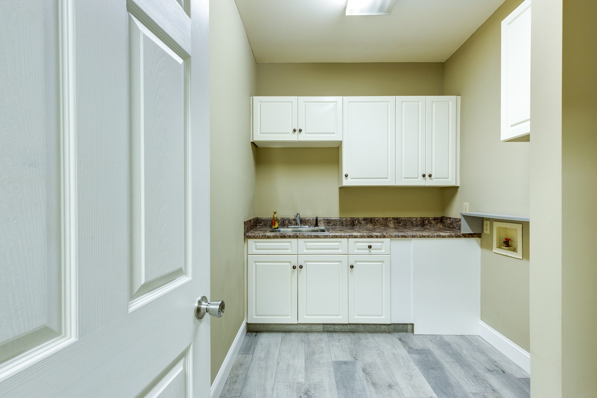 4655 Hardison Mill Road Columbia, TN 38401 - Photo 25 of 47 a bathroom with a granite countertop sink and a mirror
