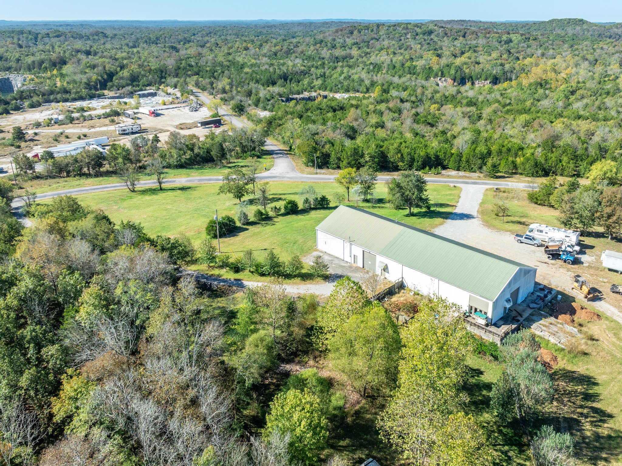 4655 Hardison Mill Road Columbia, TN 38401 - Photo 43 of 47 an aerial view of residential houses with outdoor space and trees