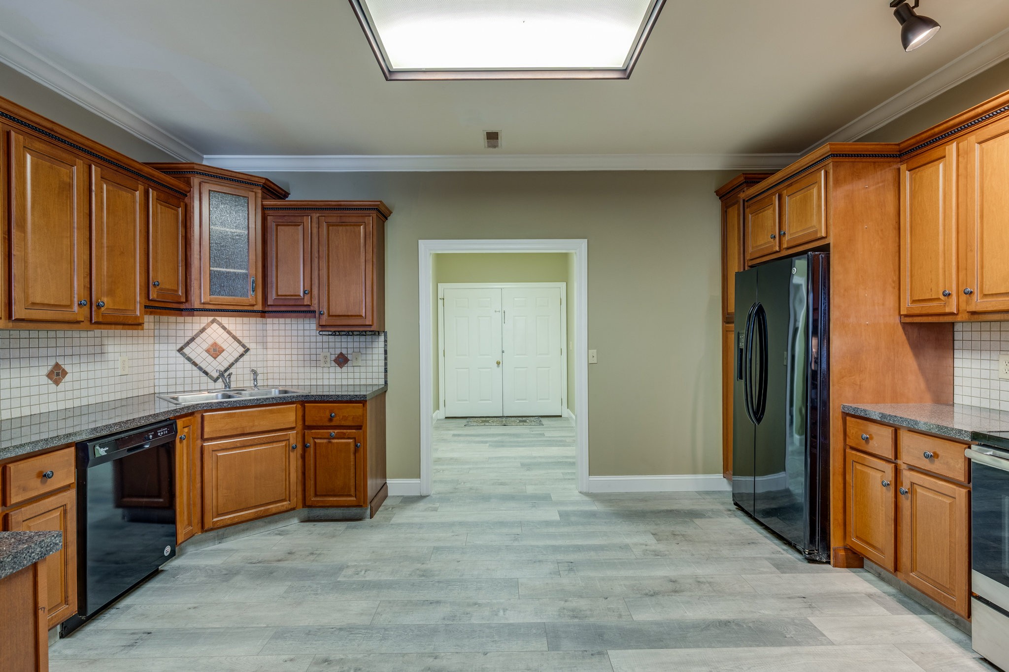 4655 Hardison Mill Road Columbia, TN 38401 - Photo 8 of 47 a kitchen with stainless steel appliances granite countertop a refrigerator and a sink